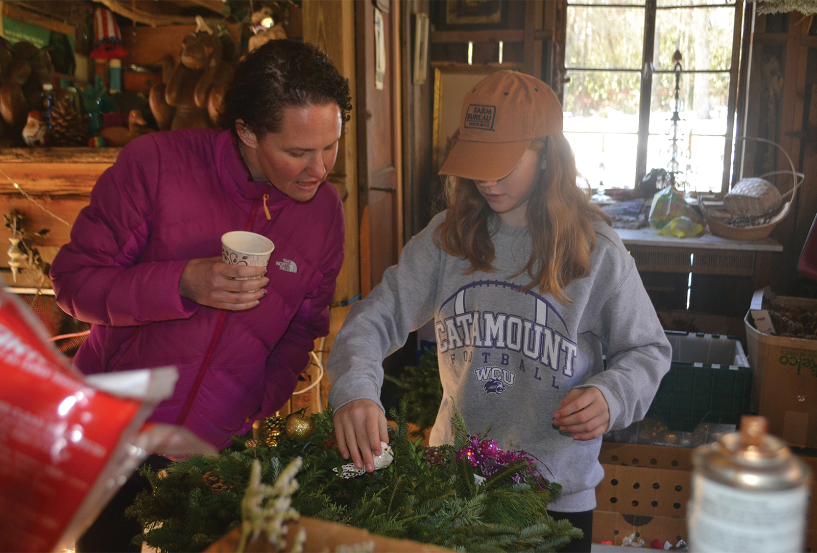 Big Brothers Big Sisters:  Big, Alissa  and Little, Mercedes, decorate Christmas wreaths