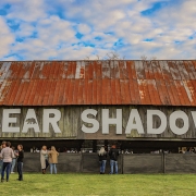 highlands-nc-bear-shadow-barn-sign-day